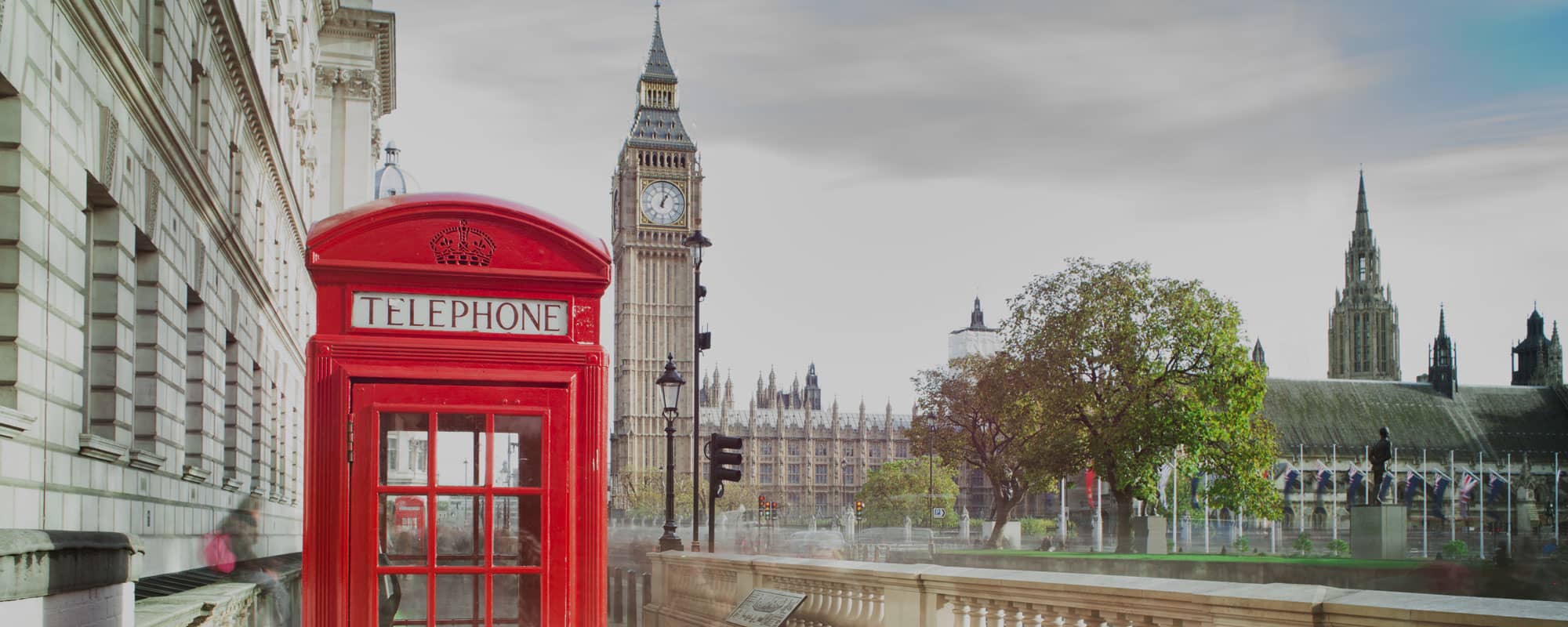 Red phone box in London with Big Ben in the background
